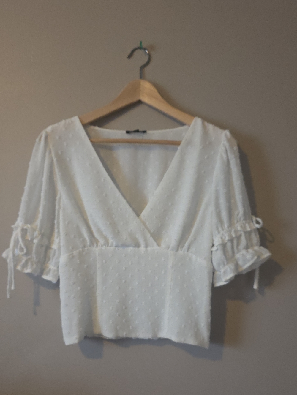 Dynamite Cream Swiss Dot V-Neck Peplum Blouse with Tie Sleeve Ruffles